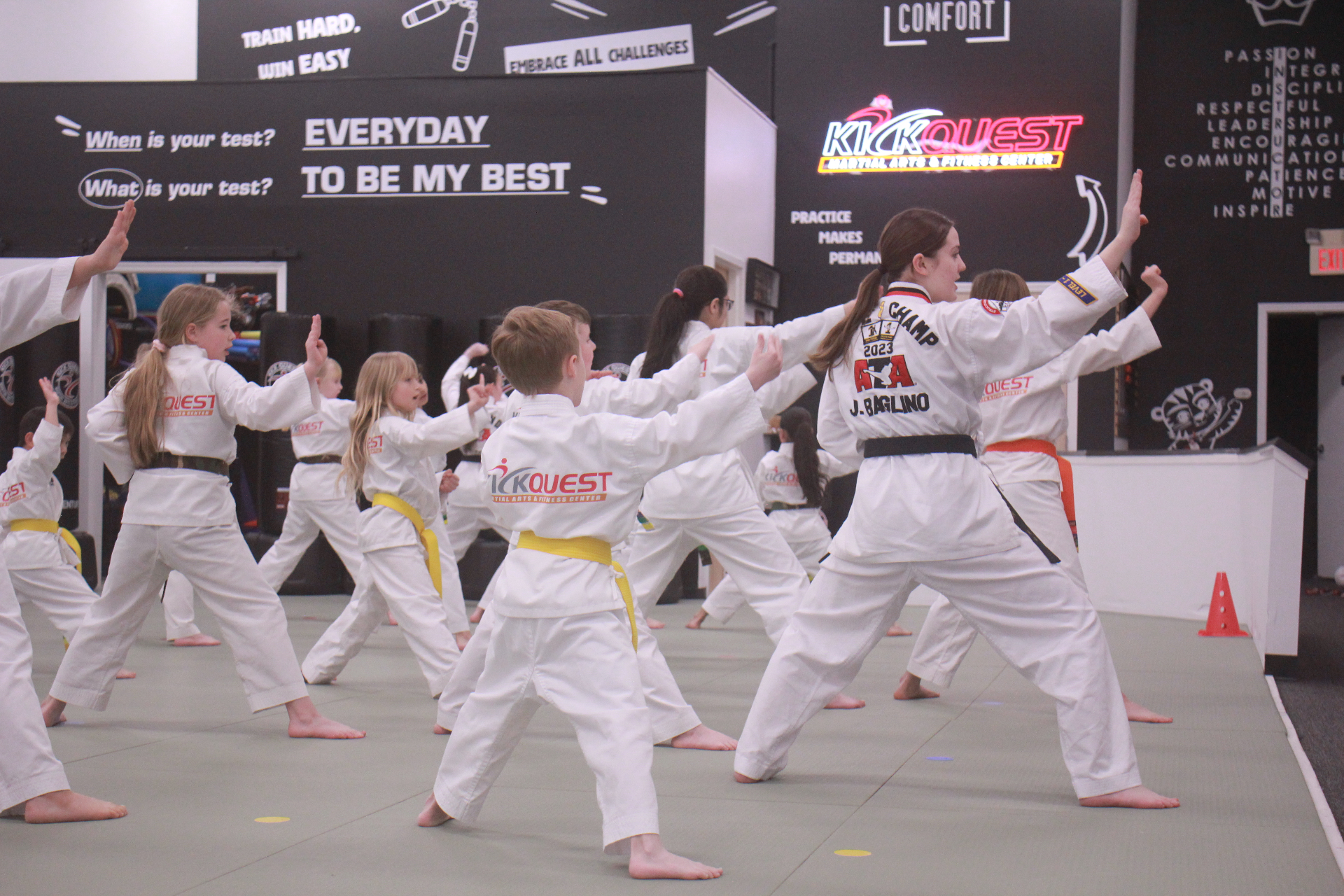 Kids Martial Arts · Ages 7–12 · Signature Program students training at KickQuest