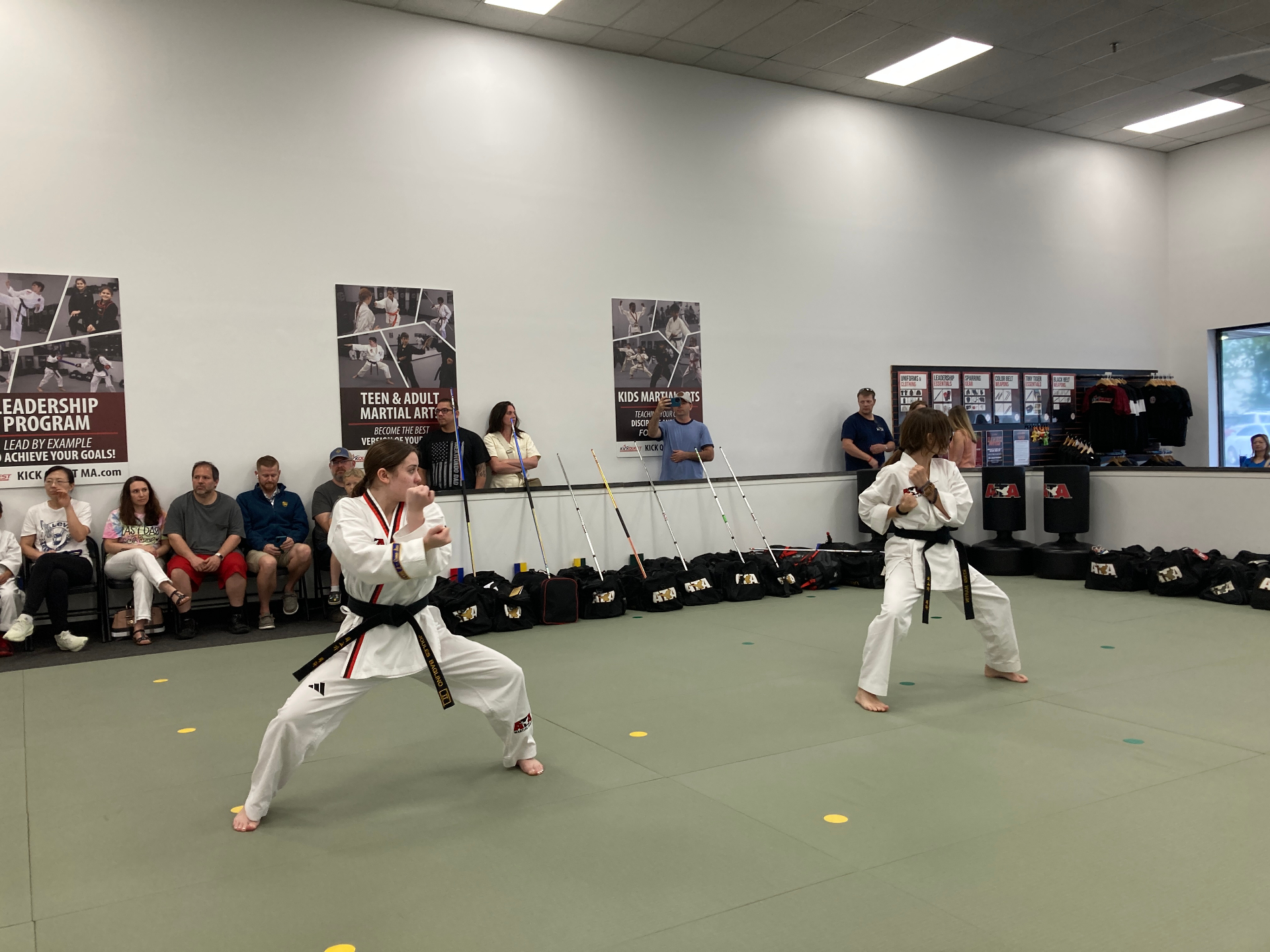 A KickQuest parent watching their child train